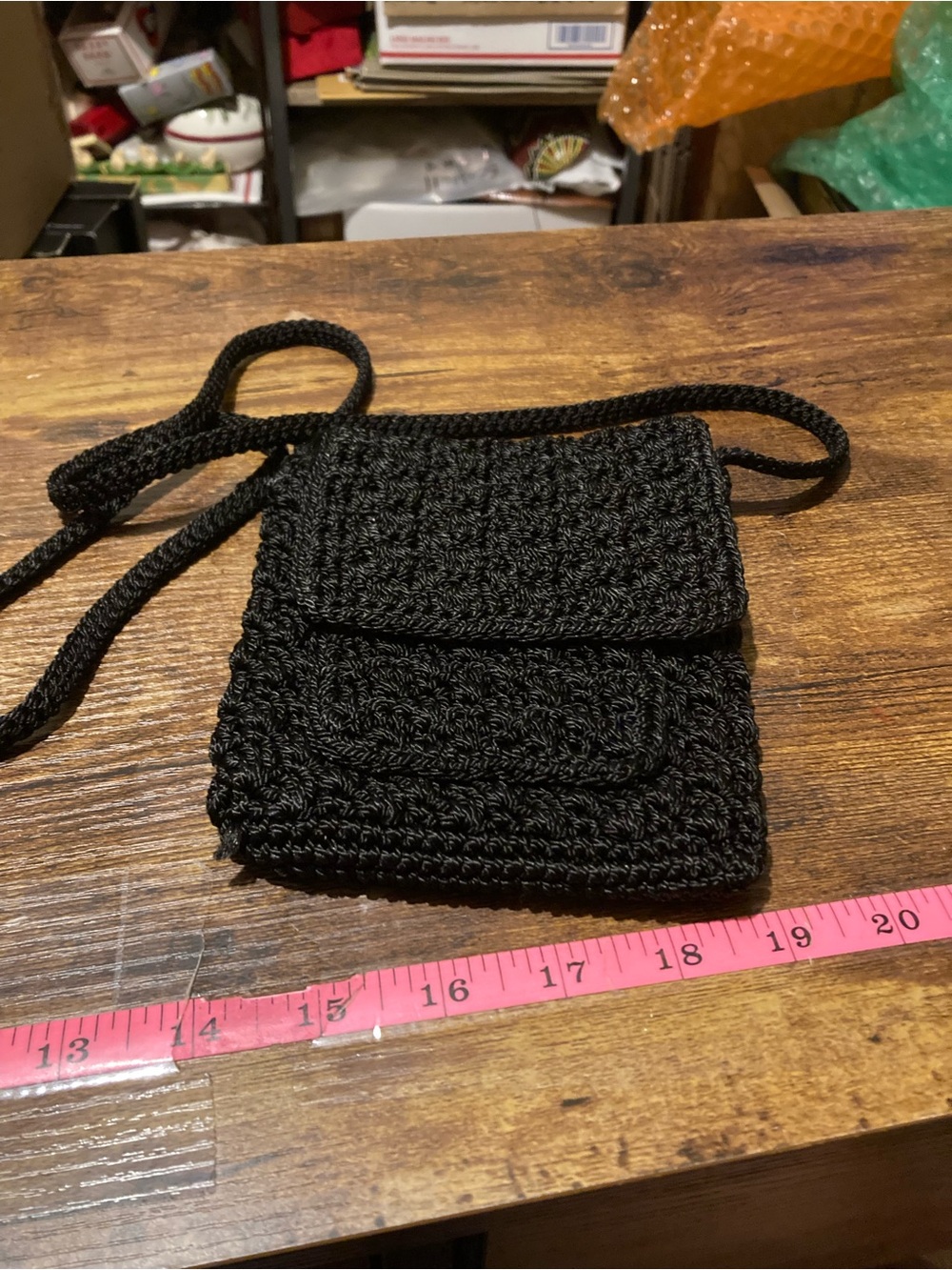 Black crocheted crossbody phone bag